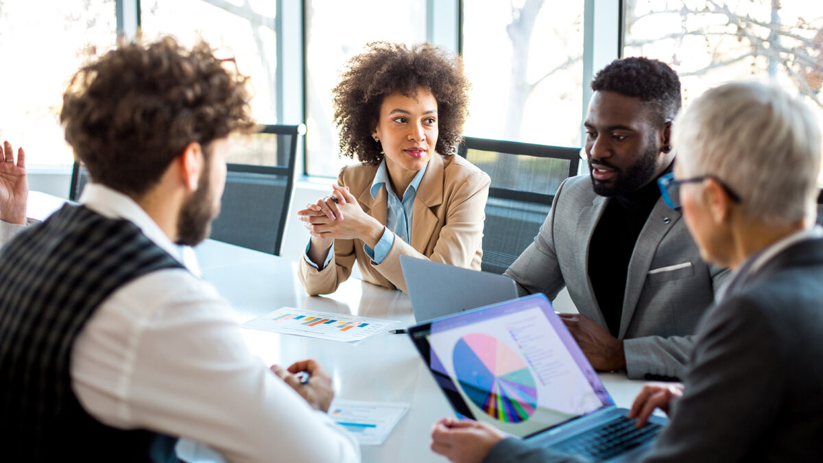 Side view of businesspeople having a meeting in the conference room